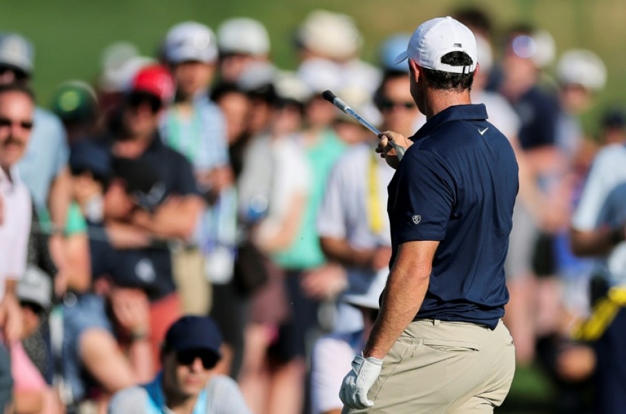 Six-time major winner Rory McIlroy yells at a heckler in the crowd who screamed while he was making a key shot at the par-five 16th hole in the final round of the PGA Championship