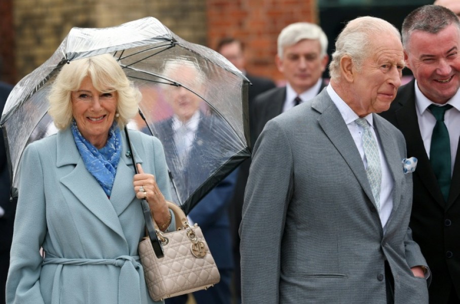 Charles and Camilla heard a performance of traditional Irish music and dance and tried out some of the instruments