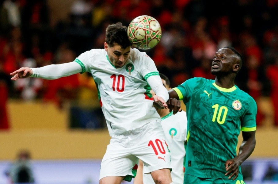 Morocco striker Brahim Diaz (L) heads the ball past Senegal captain Sadio Mane during the 2025 Africa Cup of Nations final in Rabat.