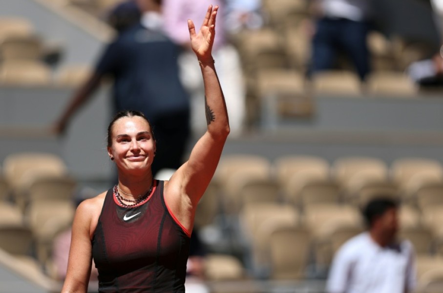 Aryna Sabalenka celebrates after winning against Jessica Bouzas Maneiro at Roland Garros