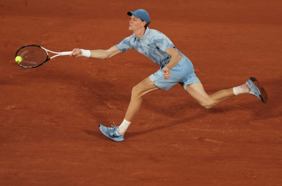 Jannik Sinner plays a forehand to Clement Tabur at the French Open