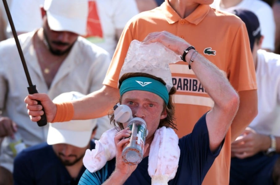 Andrey Rublev used an ice bag to cool off at the French Open on Monday