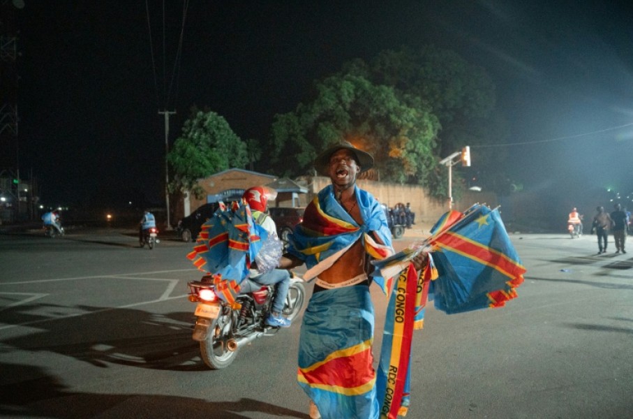 Democratic Republic of Congo fans set aside fears over the Ebola epidemic and celebrated their side's historic World Cup draw with Portugal