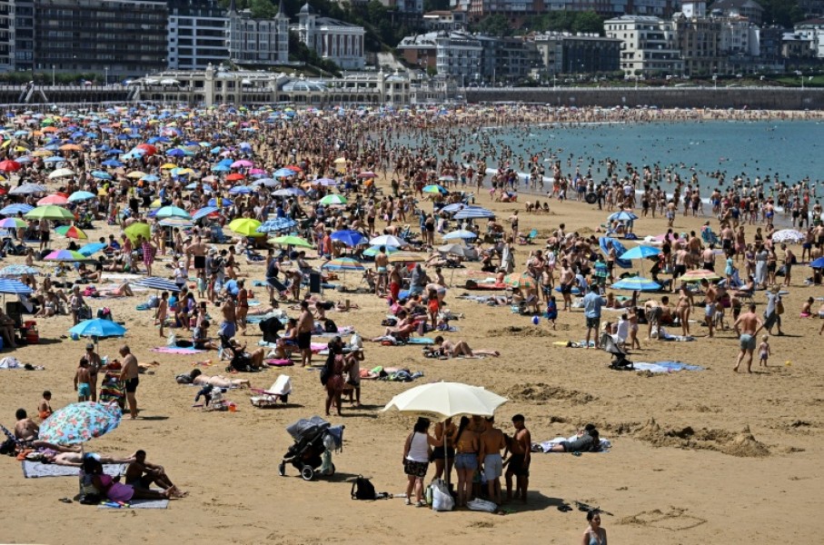 People packed beaches in Portugal and Spain, such as this one in San Sebastian