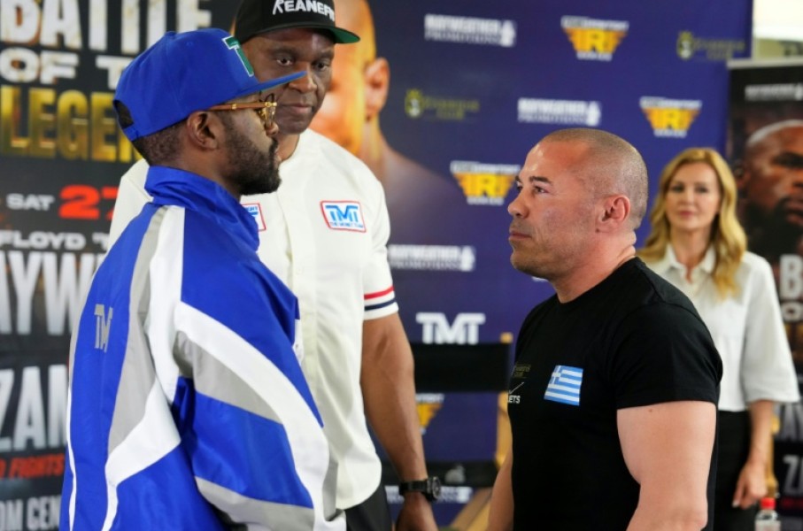 US boxer Floyd Mayweather Jr., left, and Greek kickboxer Mike Zambidis, right, reportedly will not fight on Saturday in an exhibition at Athens as originally announced