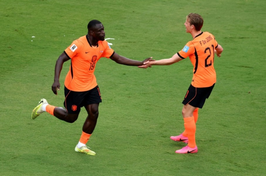 Dutch forward Brian Brobbey (left) celebrates scoring against Tunisia in their World Cup Group F match in Kansas City