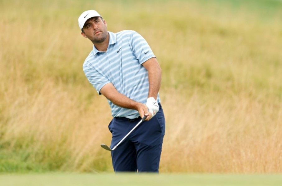 World number one Scottie Scheffler fired a 10-under par 60 to seize the lead in the second round of the PGA Tour's Travelers Championship at TPC River Highlands in Cromwell, Connecticut