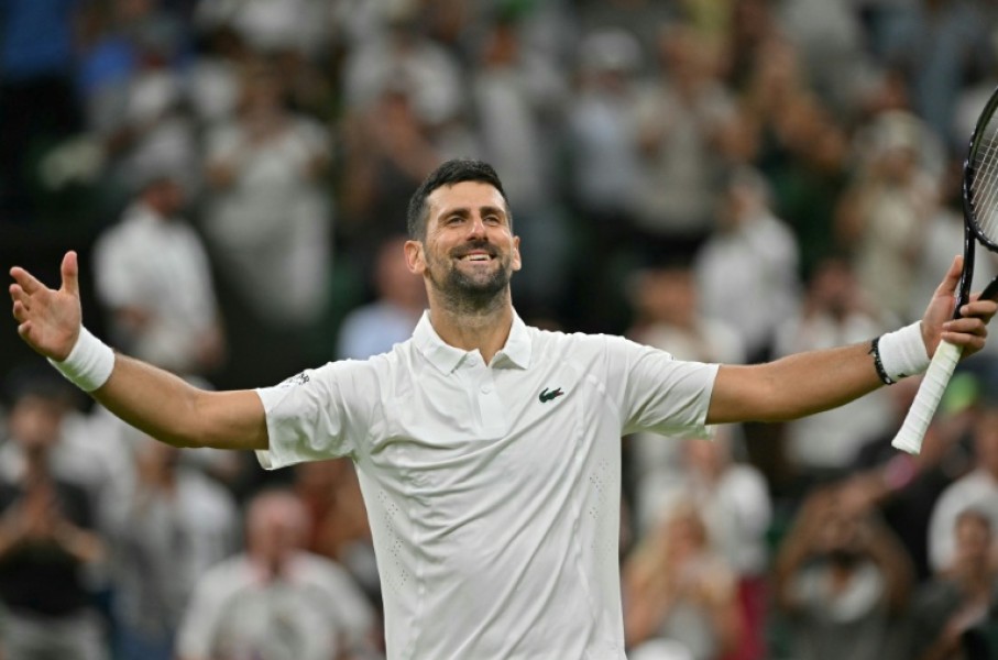 Serbia's Novak Djokovic celebrates beating China's Wu Yibing.