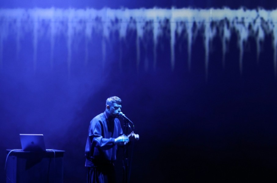 British artist Harry Yeff (also known as Reeps100) rehearses a song which uses artificial intelligence to render the human voice