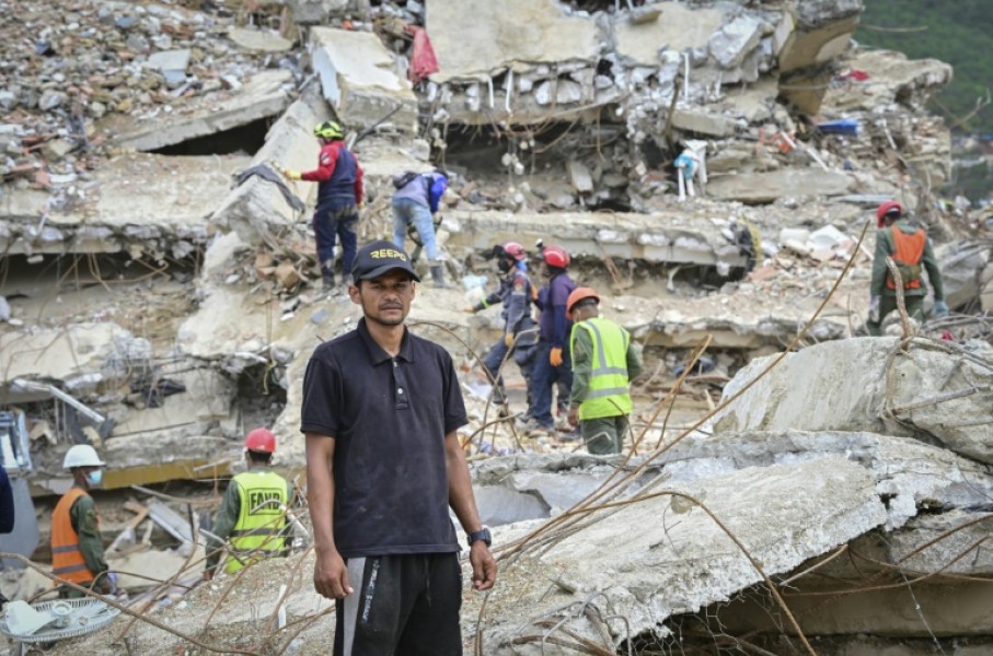 Miguel Baez is looking for the bodies of his family members in the hopes of giving them a dignified burial