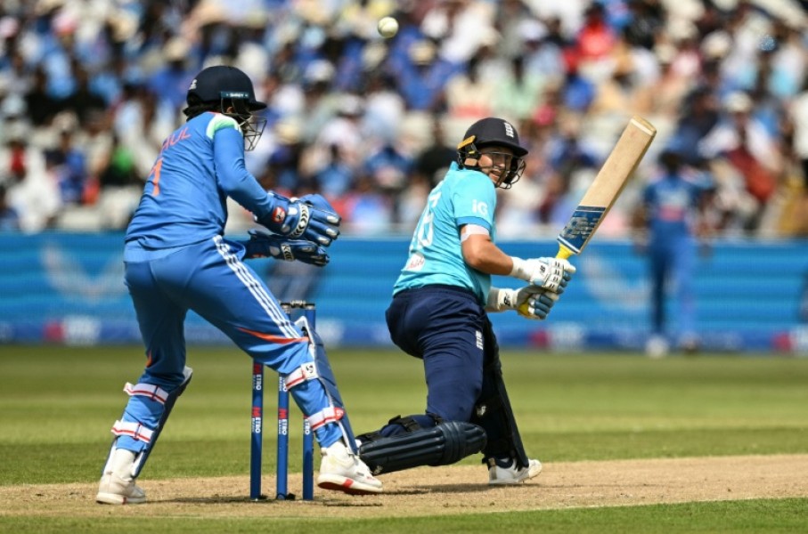 England's Joe Root (R) reverse-sweeps during his 76 not out against India in the first one-day international at Edgbaston