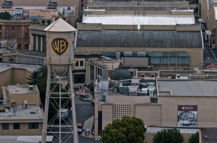 The companies are prohibited from closing their $110 billion deal for 14 days until another hearing is held on August 3