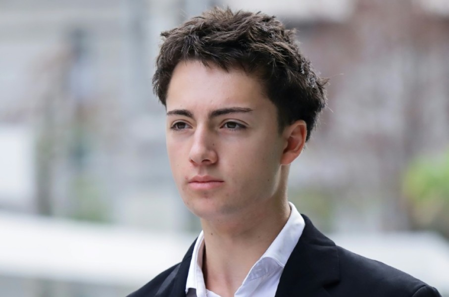 French teenager Didier Gaspard Owen Maximilien arrives at the State Courts in Singapore on July 30, 2026