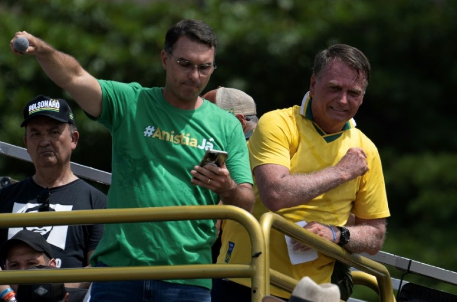 Brazil's former president Jair Bolsonaro (R) and his son Senator Flavio Bolsonaro (L) are allied with US President Donald Trump, who has backed several victorious right-wing candidates in Latin America