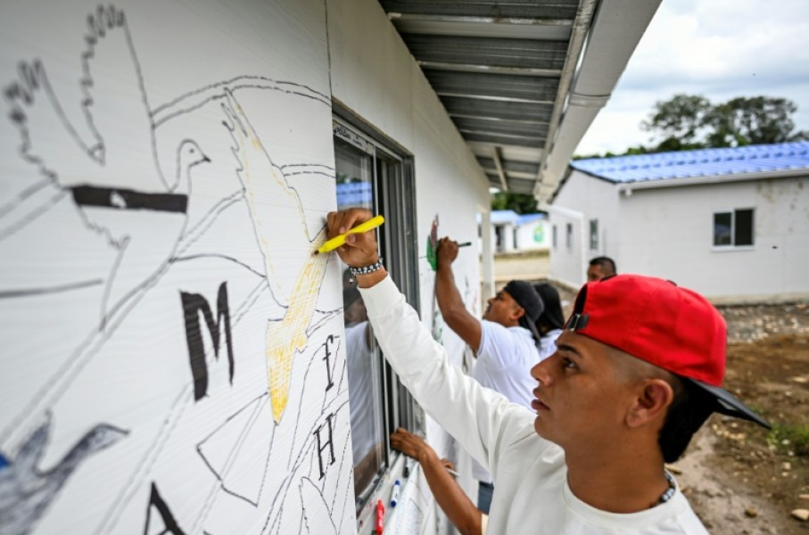 The fate of some 100 ex-guerrillas is uncertain as Colombia's left-wing government is replaced by a bellicose right-wing one