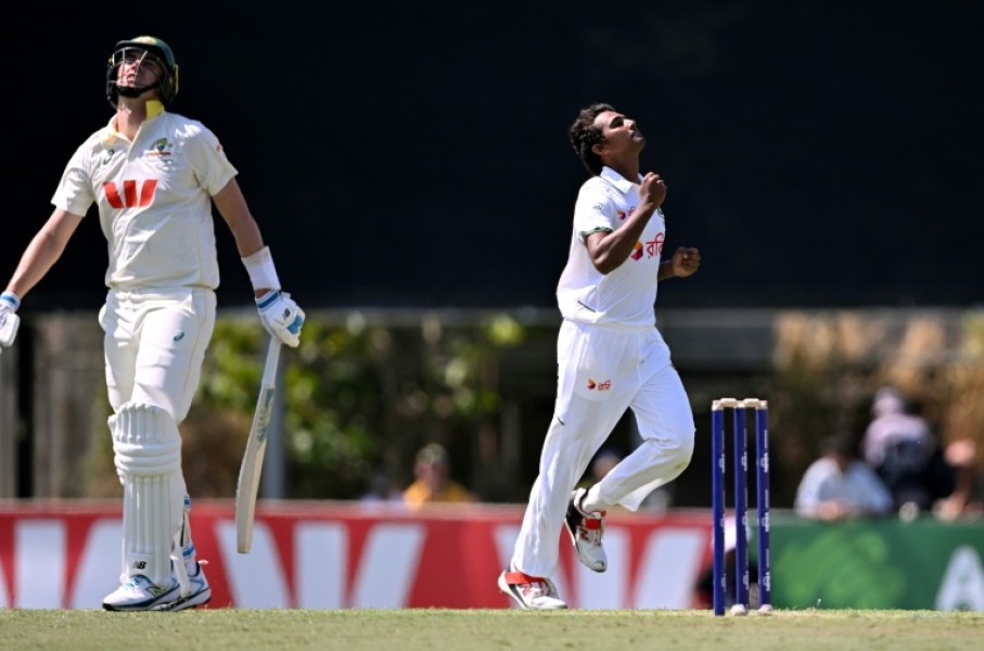Bangladesh bowler Hasan Mahmud celebrates dismissing Pat Cummins