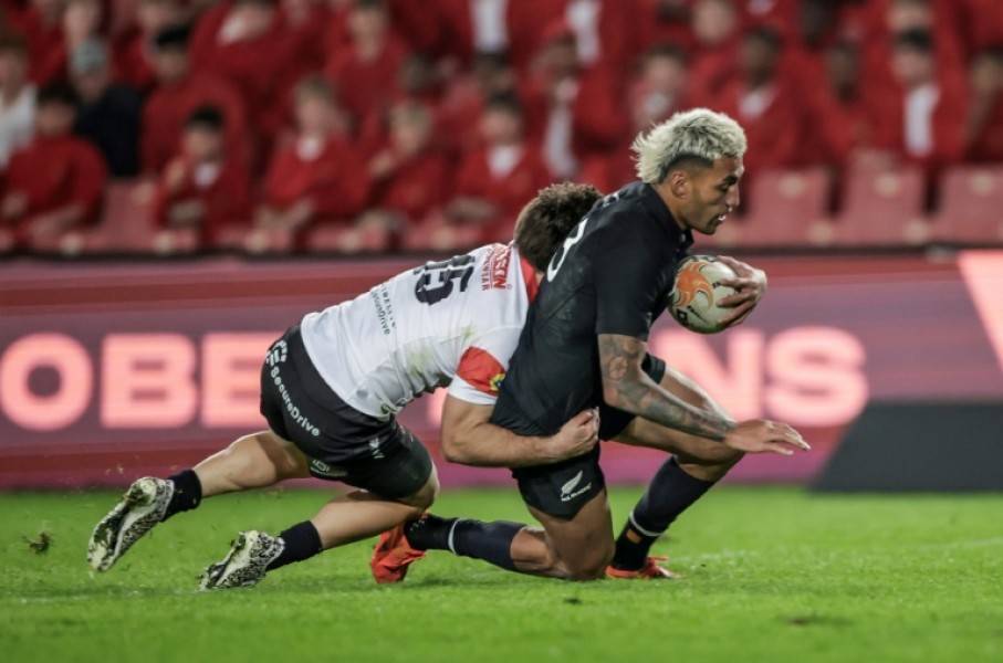 New Zealand trailed 35-17 after 49 minutes when centre Rieko Ioane (R) scored his first try