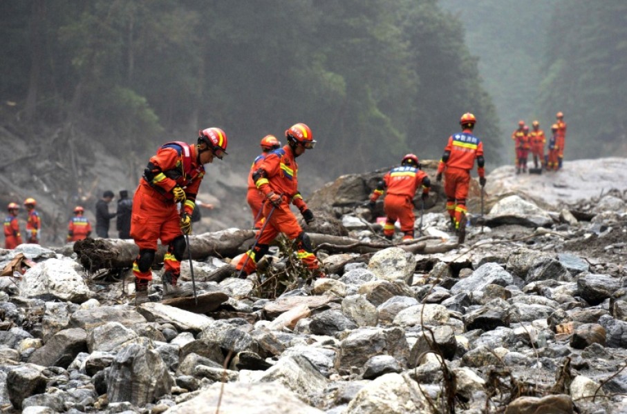 Fire and rescue personnel conduct search and rescue operations 2 kilometers from Gyirong Port days after the August 26 mudslide
