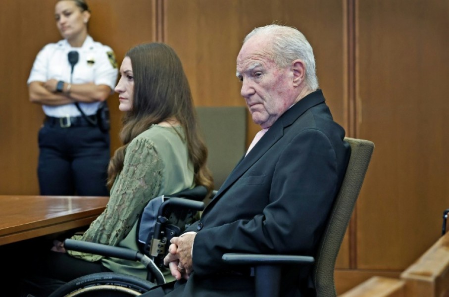 Lindsay Clancy, pictured here in court with her lawyer, Kevin Reddington, was on trial for the murder of her three young children