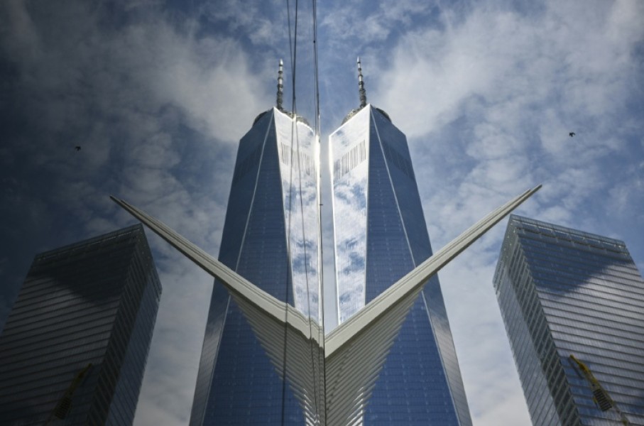 A new skyscraper, One World Trade Center, rises from the New York location of the Twin Towers that were destroyed in the 9/11 attacks of 2001
