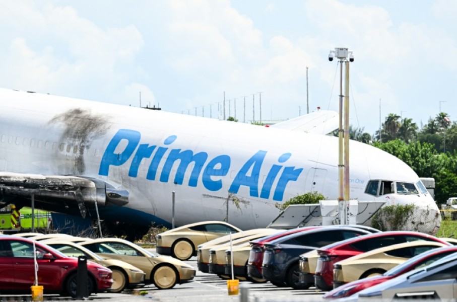 An Amazon cargo plane overran the runway at Miami airport on Sunday, killing five people