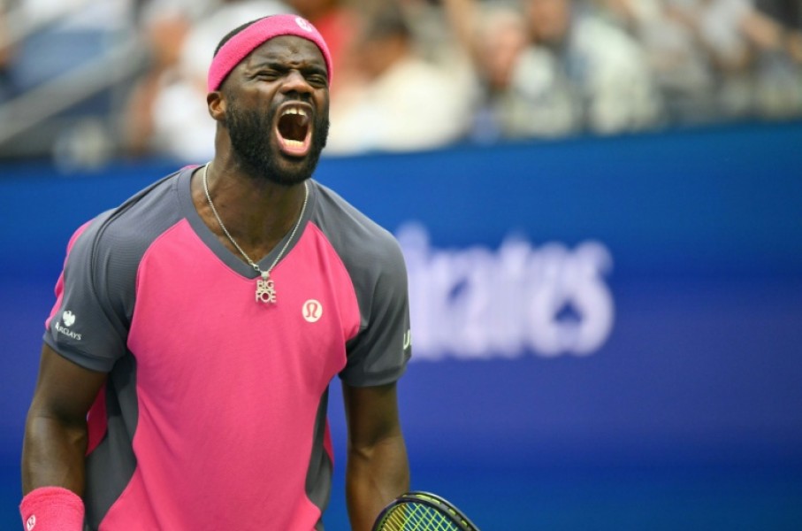 American Frances Tiafoe is through to the US Open semi-finals after a five-set victory over Alex Michelsen