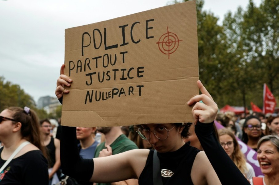'Police everywhere, justice nowhere': many of the placards reflected mistrust of the police