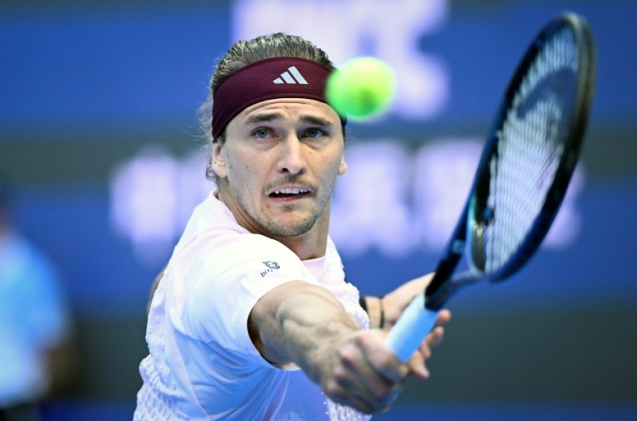 Germany's Alexander Zverev hits a return to Britain's Cameron Norrie during their men's singles first round tennis match at the China Open tennis tournament in Beijing on October 1, 2026.