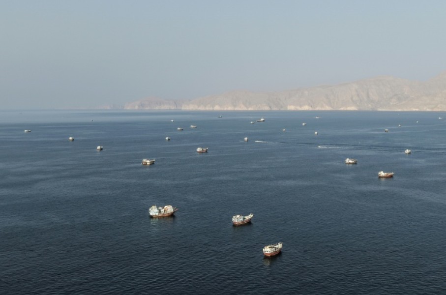 Ships anchored off the coast of Musandam governorate in Oman near the Strait of Hormuz on Friday