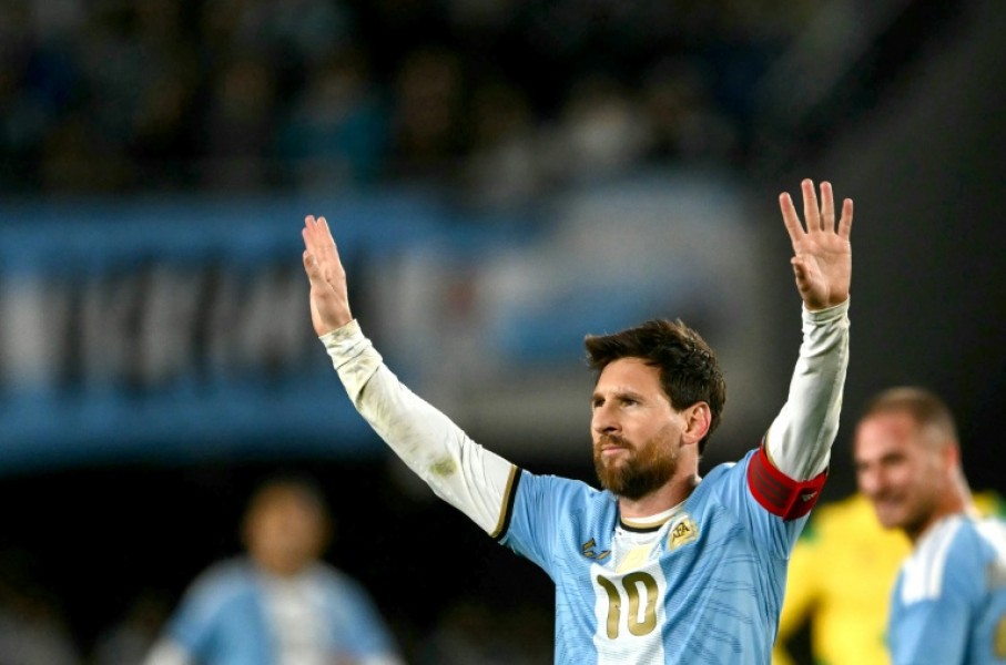 Lionel Messi celebrates scoring in his final international appearance for Argentina