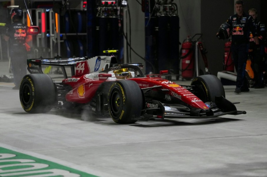 Ferrari's British driver Lewis Hamilton in the pit lane during the Singapore Grand Prix