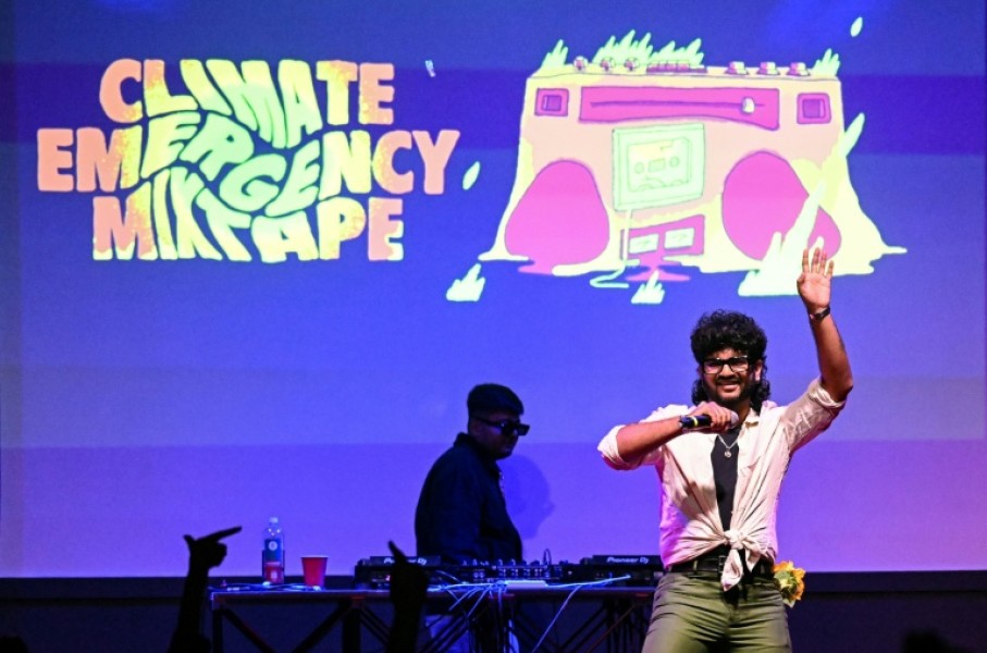 This photograph taken on October 1, 2026 shows rapper Kali, aka Akshay, performing onstage during the launch of the Indian multi-lingual rap album on climate crisis 'Climate Emergency Mixtape' at The Humming Tree in Bengaluru.