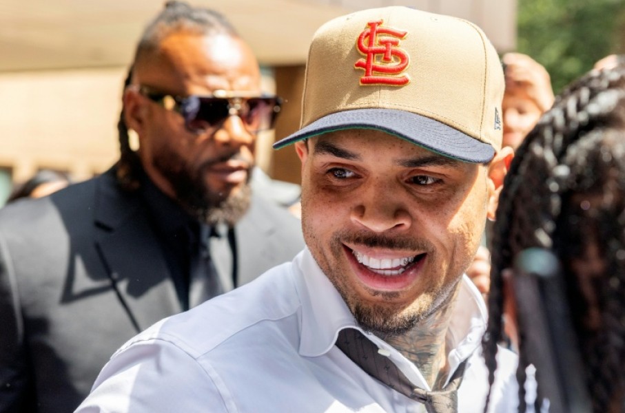 US singer Chris Brown leaves a UK court after pleading guilty to affray during a 2023 London nightclub brawl