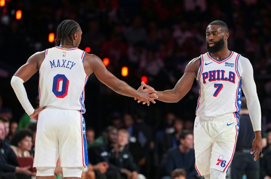 Tyrese Maxey celebrates with Philadelphia 76ers team-mate Jaylen Brown in their win over Milwaukee