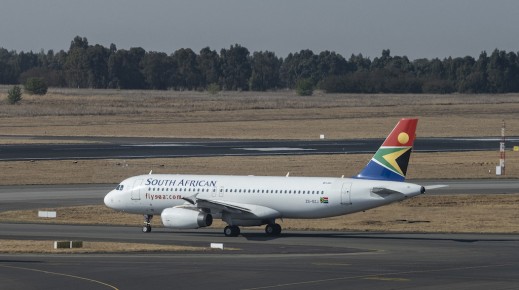 A SAA plane is seen on the tarmac before departing from the OR Tambo International Airport. AFP/Emmanuel Croset