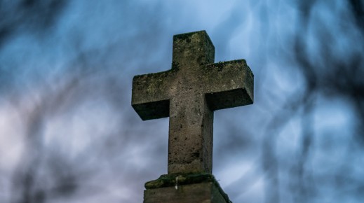 File: Detail of a catholic cross on a grave in the cemetery. Xose Bouzas/Hans Lucas via AFP