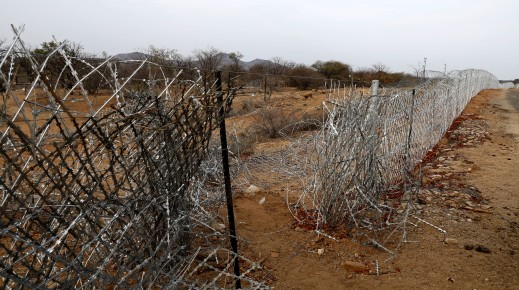 File: A vandalised border fence that separates South Africa and Zimbabwe where near the Beitbridge border post. AFP/Phill Magakoe
