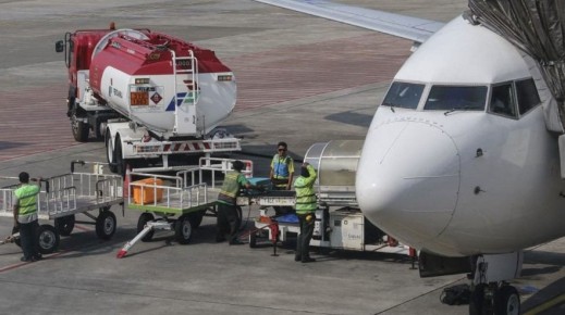 File: Jet fuel tankers parked at a plane. Agoes Rudianto/NurPhoto via AFP