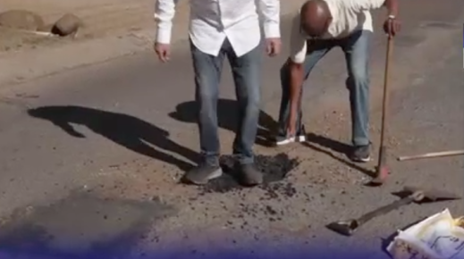 Sandown Estate residents in Sandton fixing potholes.