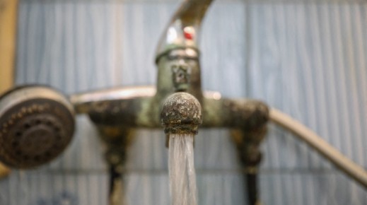 File: Water flows from a tap. Chedly Ben Ibrahim/NurPhoto via AFP