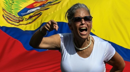 A woman shouts slogans during a rally in support of ousted Venezuelan leader Nicolas Maduro and his wife Cilia Flores in Caracas