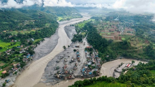 The death toll stands at 392 after a devastating tsunami-like wall of freezing water and mud wiped out towns under a torrent of sludge, engulfing homes, smashing bridges and dams and sweeping vehicles away like toys
