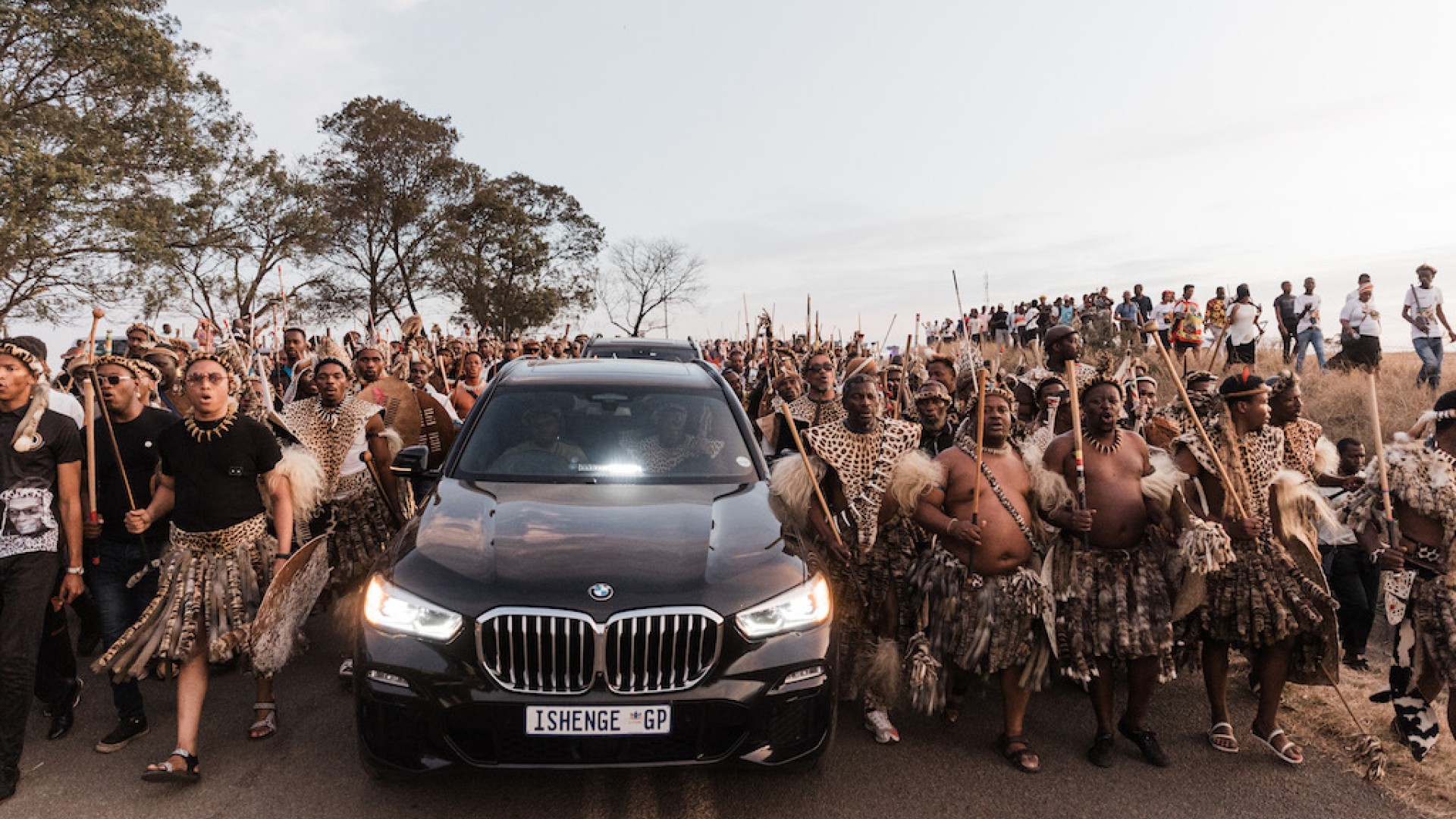 Amabutho (Zulu regiments) sing and chant praises in front of a convoy carrying the coffin of Mangosuthu Buthelezi. AFP/Rajesh Jantilal