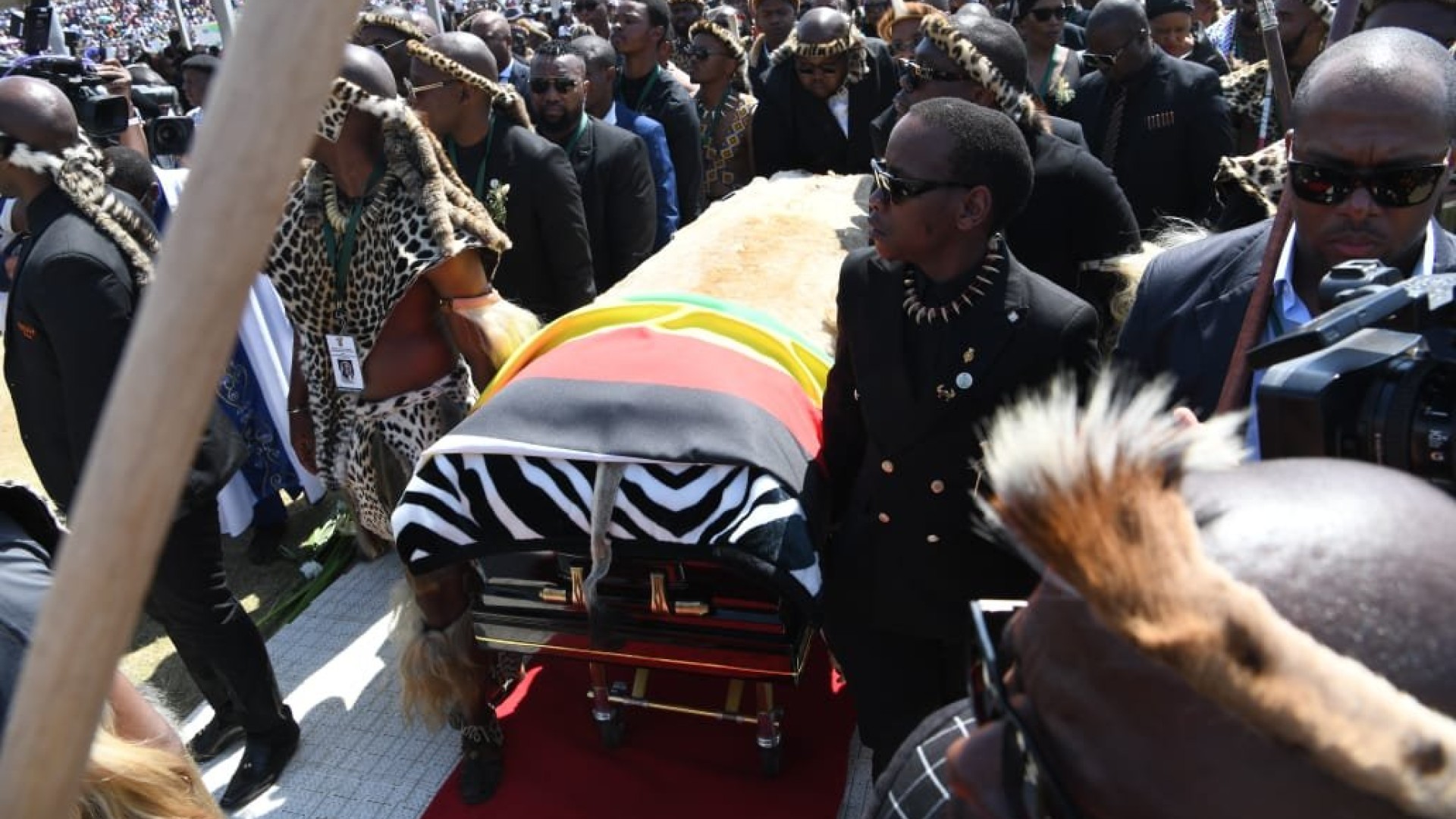 Prince Mangosuthu Buthelezi's coffin being carried onto the podium. GCIS