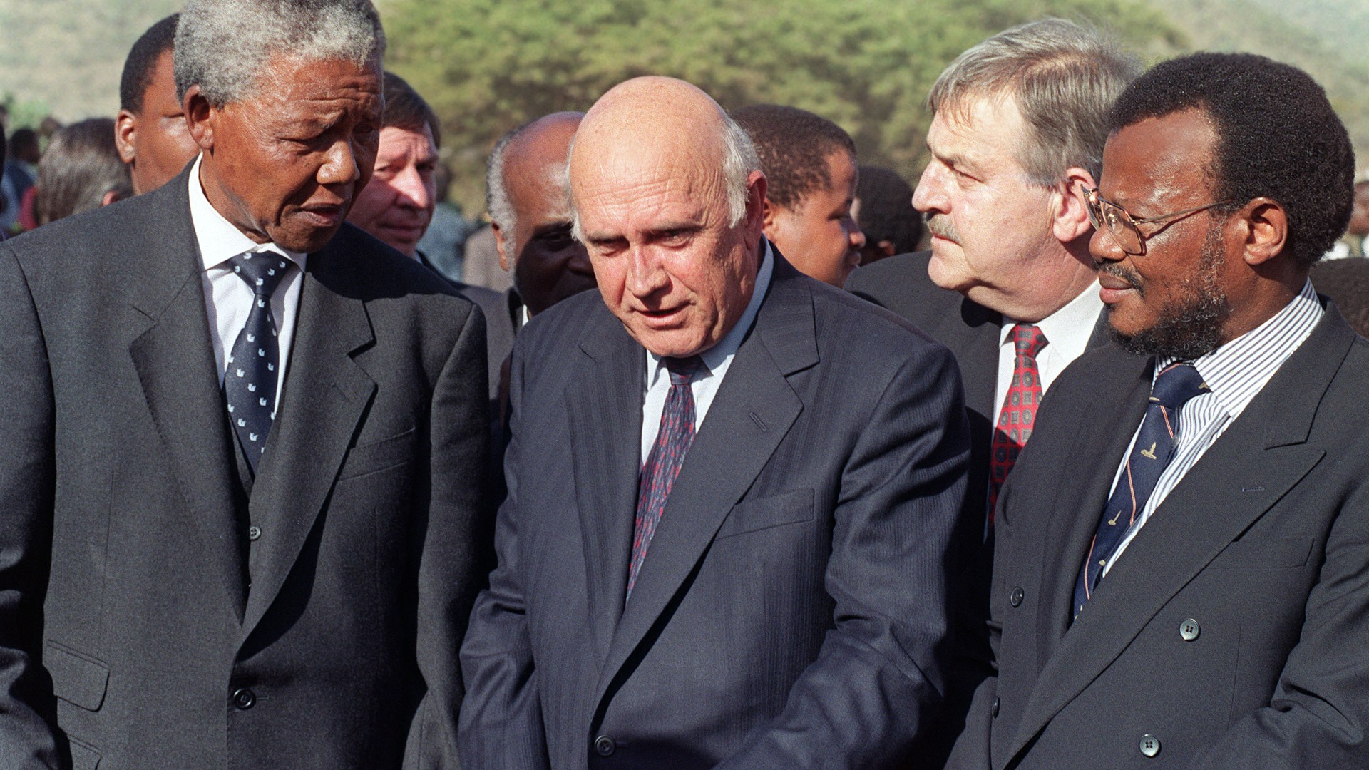 African National Congress (ANC) President Nelson Mandela, South African President Frederik W. De Klerk, South African Foreign Minister Pik Botha and Inkatha Freedom Party leader Mangosuthu Buthelezi, gather 03 April 1994 in Moria near Pietersburg during the Zion Christian Church (ZCC) meeting.