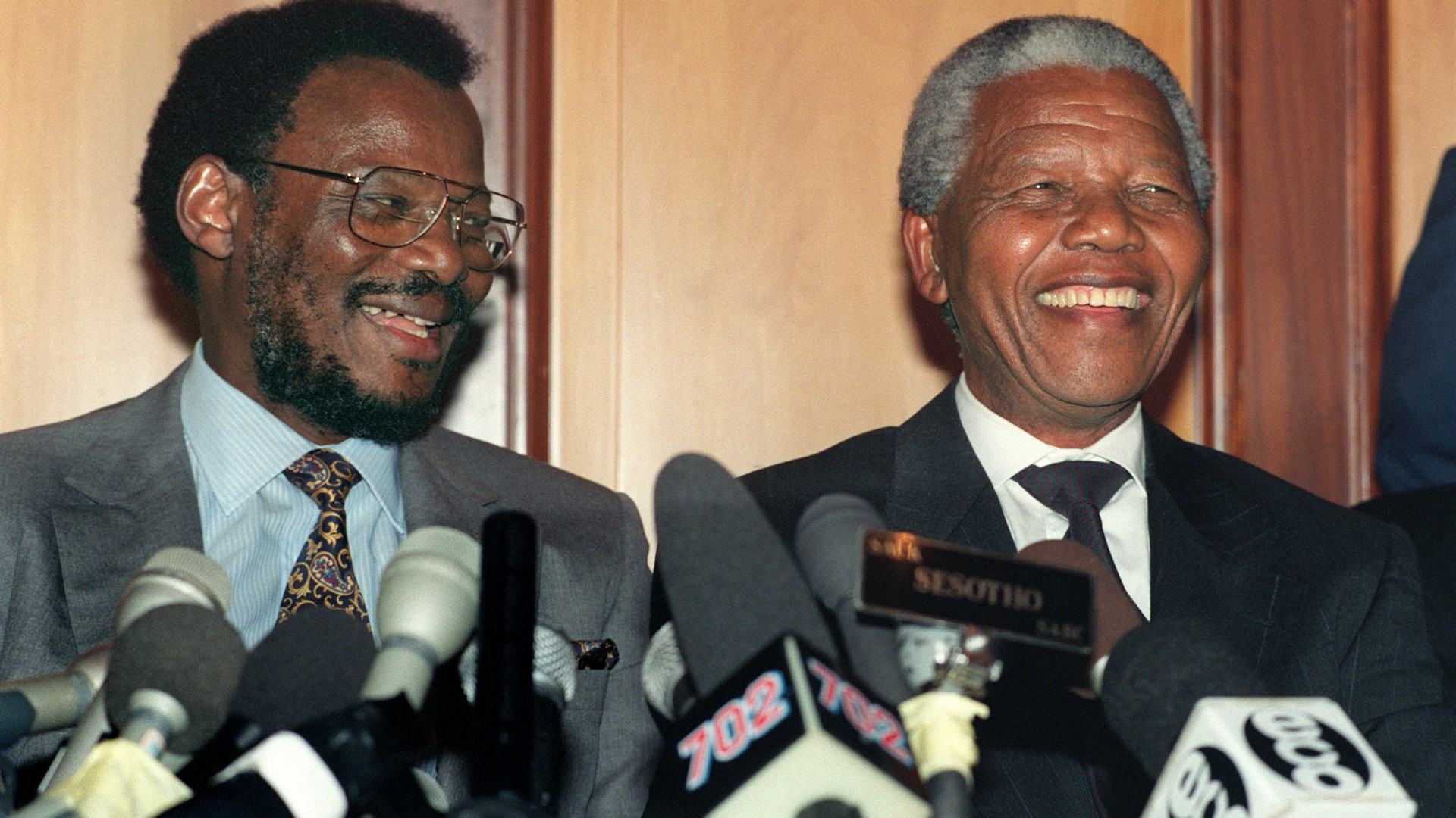 African National Congress (ANC) President Nelson Mandela (R) shares a laugh with Zulu's Inkatha Freedom Party leader Mangosuthu Buthelezi during a joint media conference at Durban after their day-long meeting in Durban, 01 March 1994.