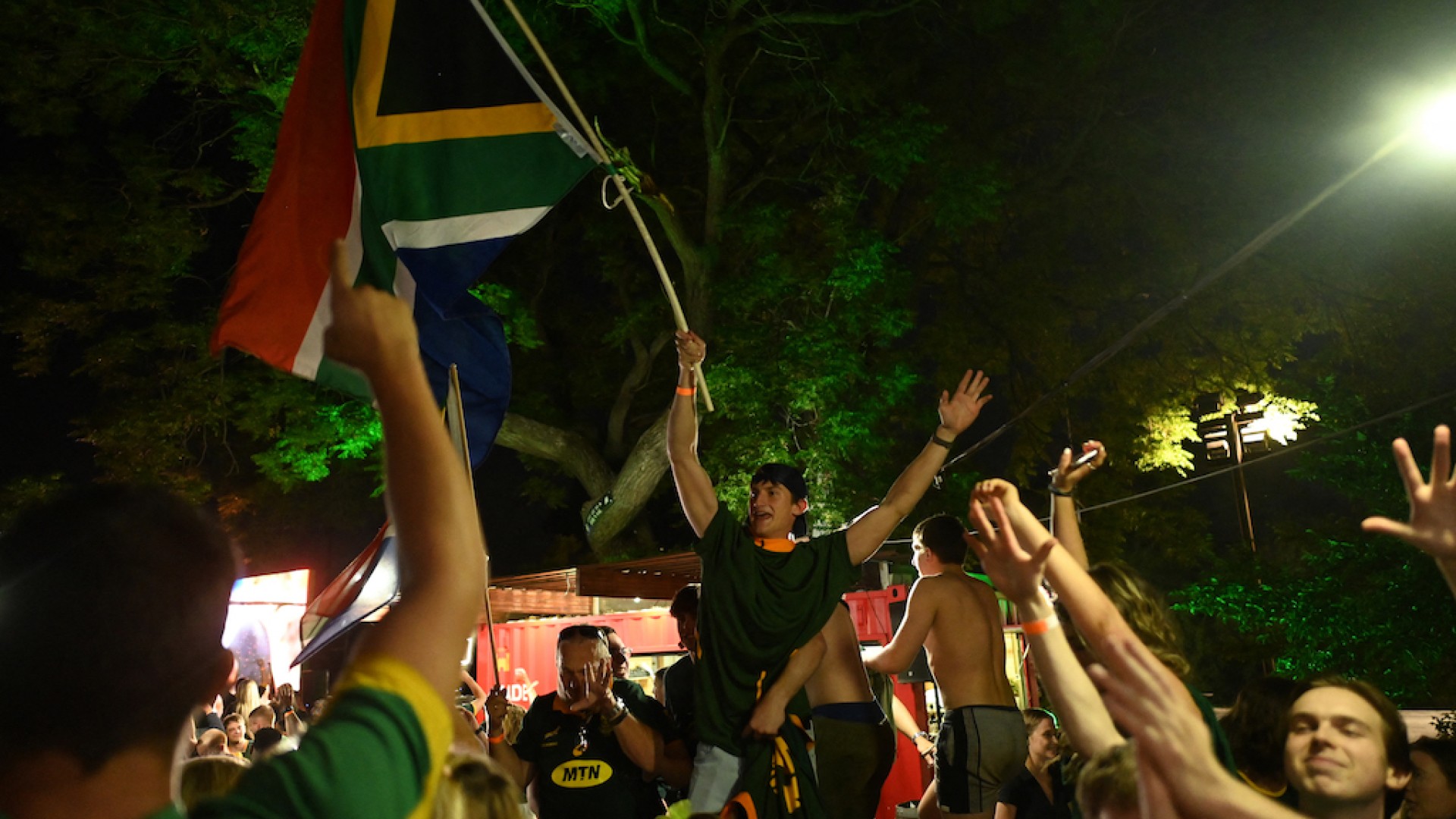 Supporters celebrate at the Pirates Club in Johannesburg. AFP/Luca Sola