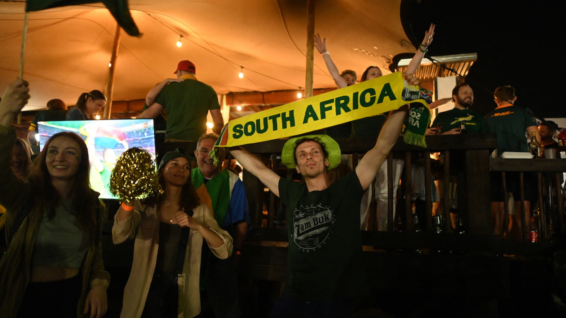 Supporters celebrate at the Pirates Club in Johannesburg . AFP/Luca Sola