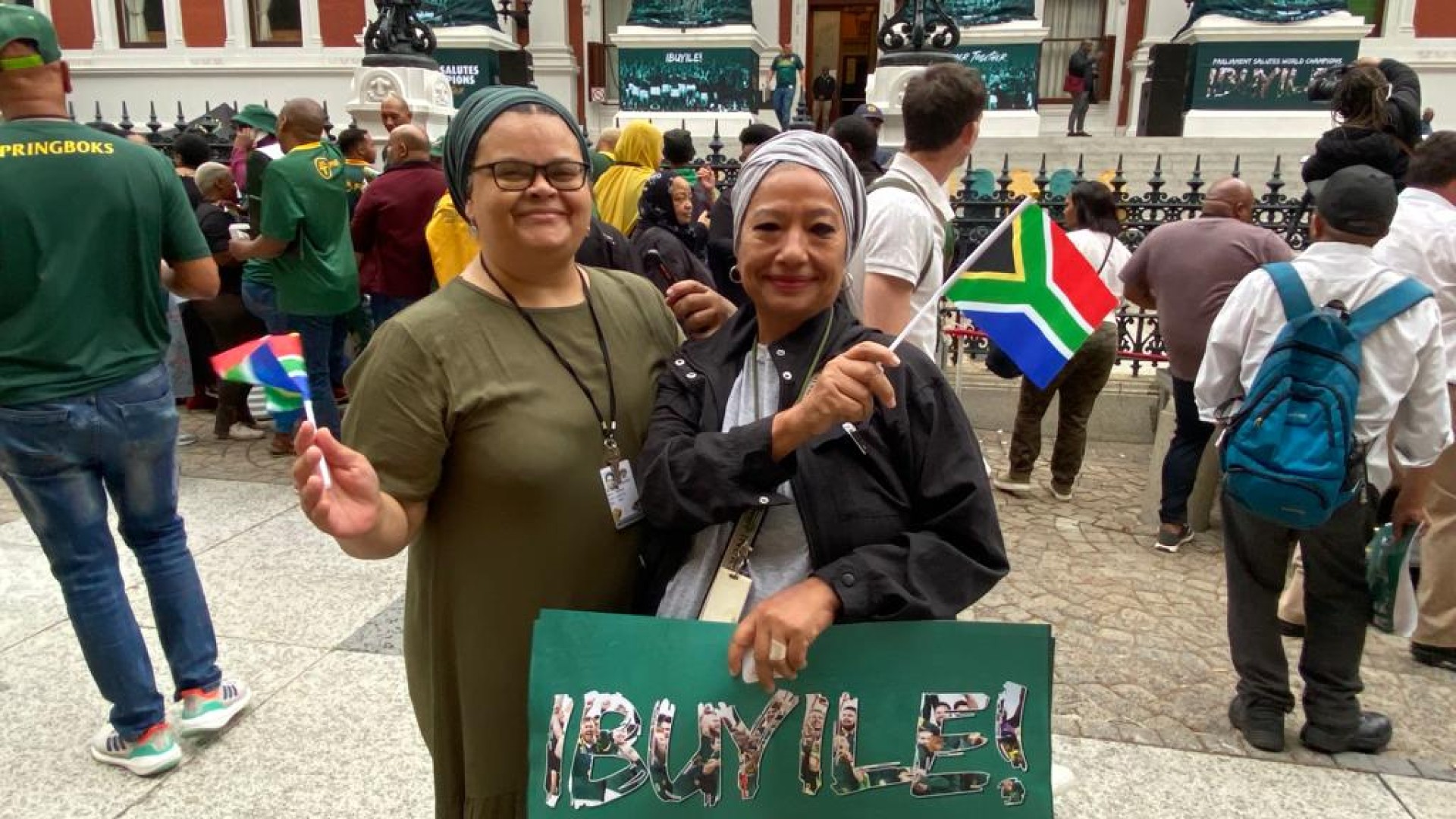 Fans with placards showing support for the boks