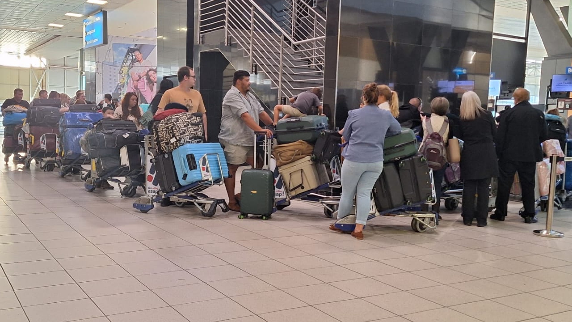 The first group of 49 Afrikaner 'refugees ' leaving South Africa for the US.